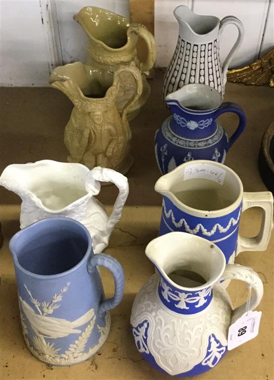 8 Victorian Wedgwood & salt glazed jugs(-)